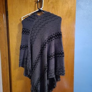 Angled, hooded poncho